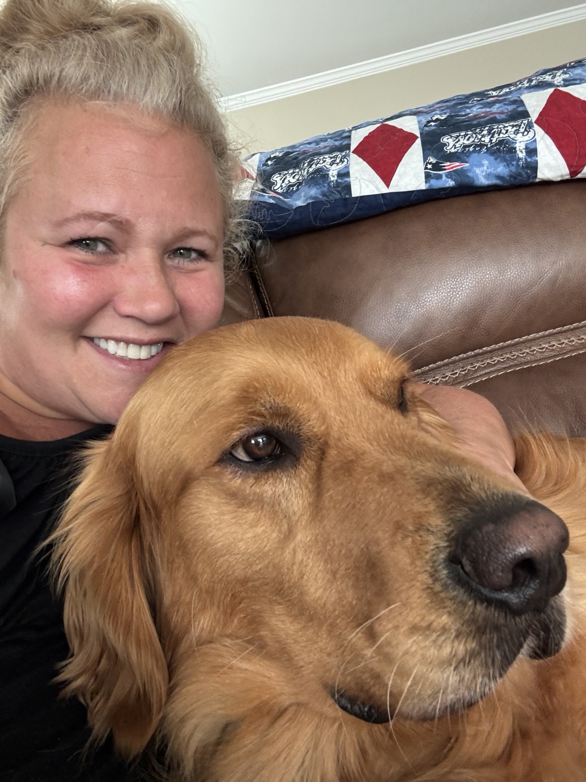 Happy golden retriever smiling at home